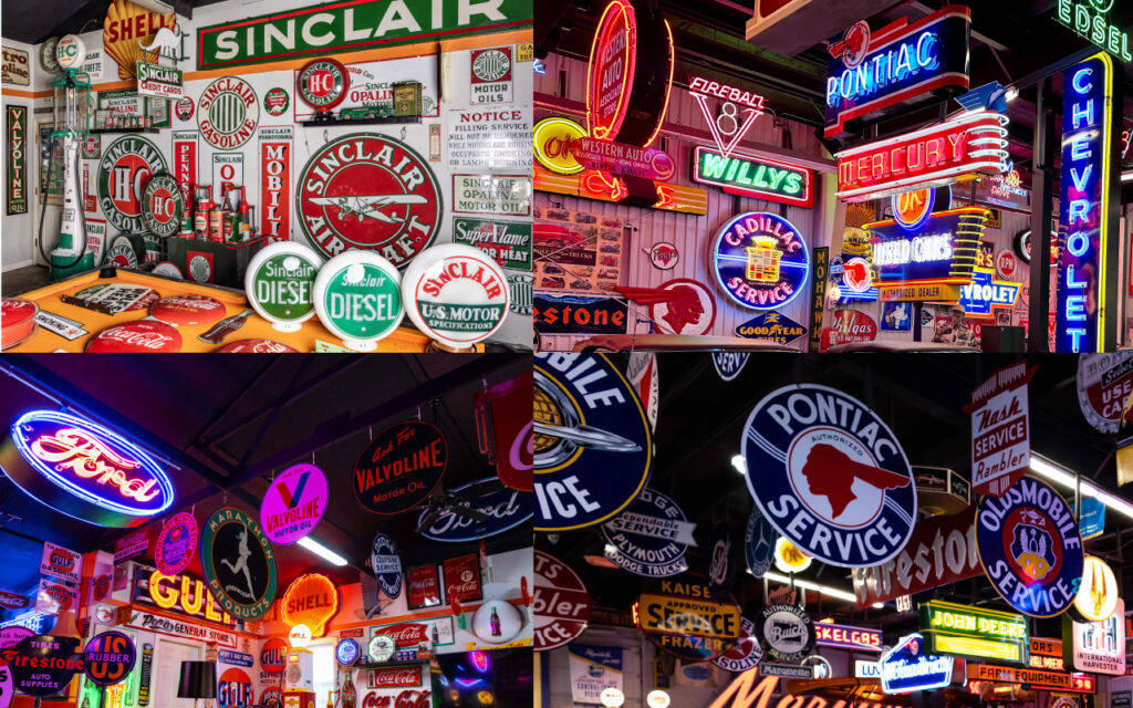 An image showing a collection of old gas station signs displayed on a wall.