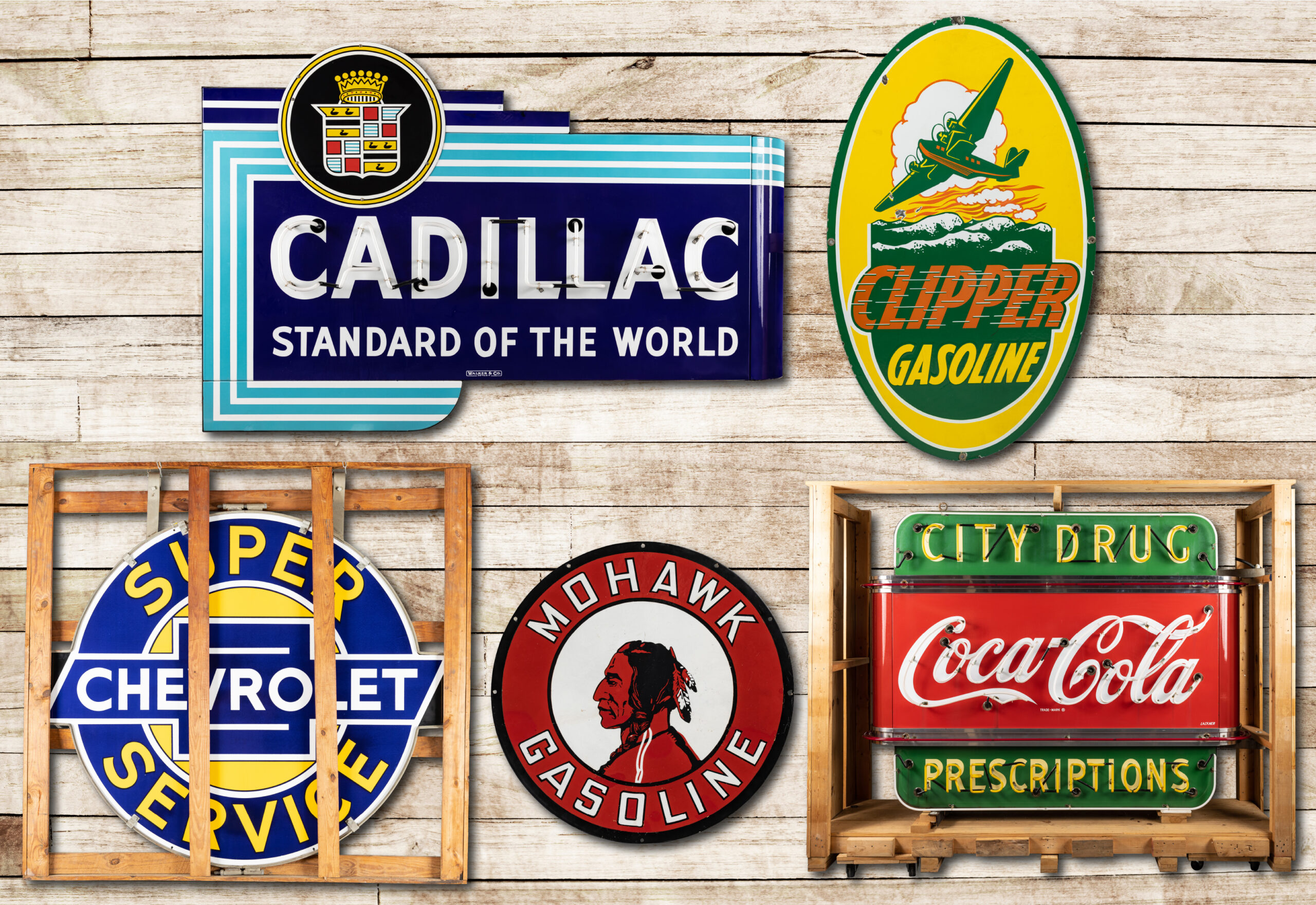 A collection of colorful vintage tin signs with different designs