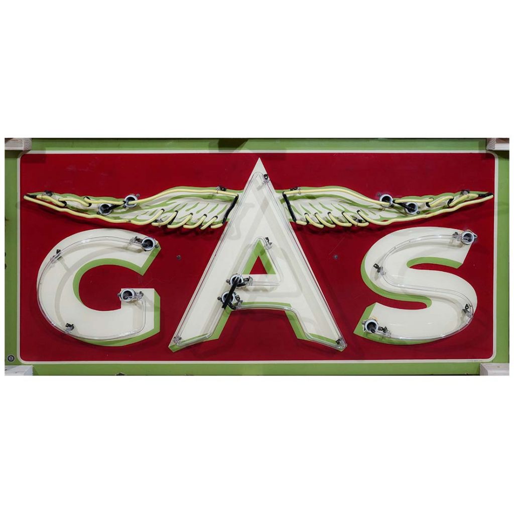 A vintage gas station sign with other memorabilia